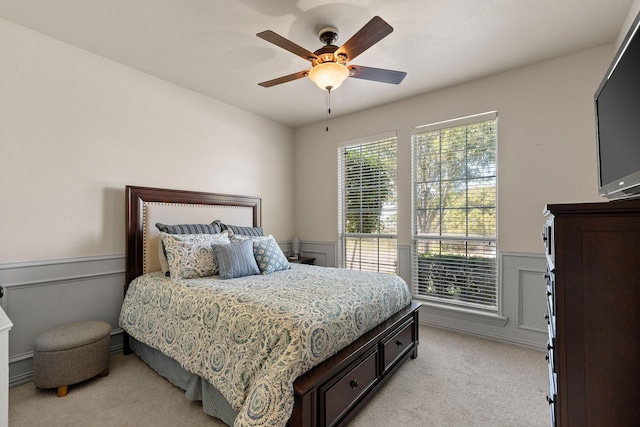 1185 Shores Blvd, Rockwall, TX 75087 - bedroom featuring a ceiling fan, wainscoting, and light carpet