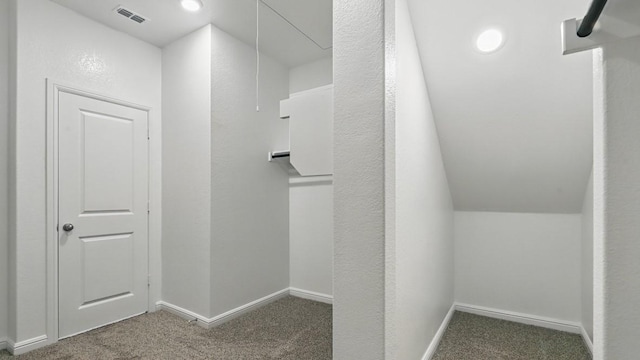 interior space featuring visible vents and carpet