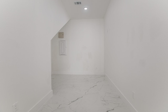 interior space featuring visible vents and marble finish floor