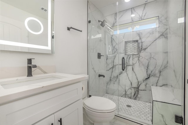 full bathroom with visible vents, vanity, toilet, marble finish floor, and a marble finish shower