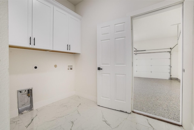 laundry room with gas dryer hookup, washer hookup, electric dryer hookup, cabinet space, and marble finish floor