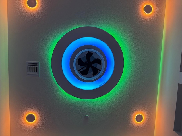 details featuring visible vents and a ceiling fan