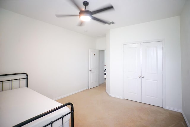 3301 Ski Lift Ct, Mckinney, TX 75070 - bedroom featuring light carpet, baseboards, a closet, and ceiling fan
