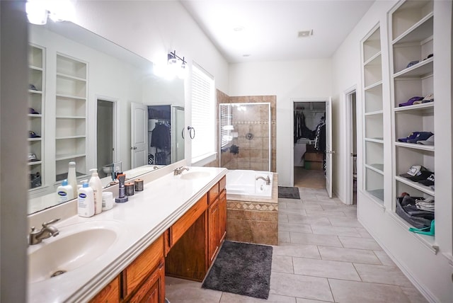 3301 Ski Lift Ct, Mckinney, TX 75070 - full bathroom with a spacious closet, tile patterned flooring, a stall shower, and double vanity