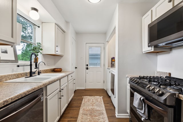 3049 Rotan Ln, Dallas, TX 75229 - kitchen with a sink, light countertops, stainless steel appliances, and white cabinetry