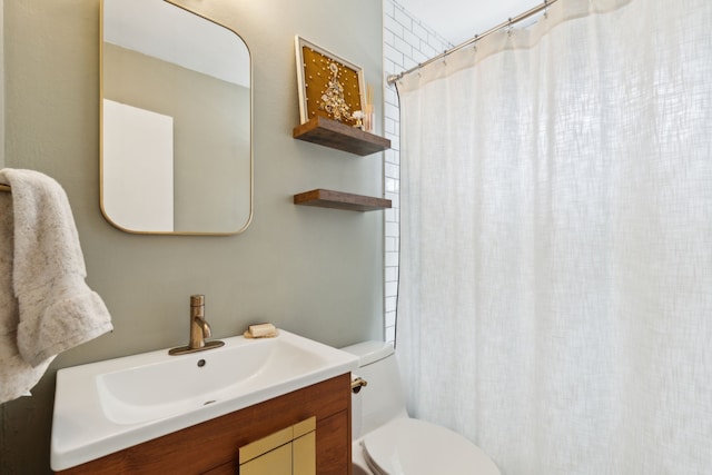 3049 Rotan Ln, Dallas, TX 75229 - bathroom featuring vanity, toilet, and curtained shower