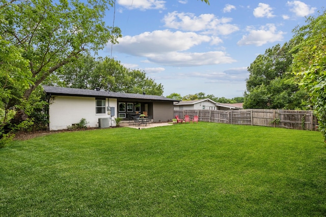3049 Rotan Ln, Dallas, TX 75229 - back of house featuring a lawn, fence, a patio area, and cooling unit