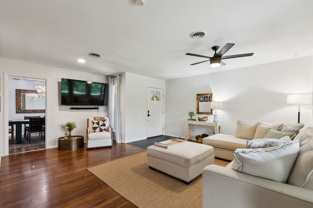 3049 Rotan Ln, Dallas, TX 75229 - living room featuring a ceiling fan, baseboards, visible vents, and wood finished floors