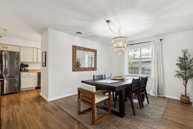 3049 Rotan Ln, Dallas, TX 75229 - dining area with baseboards, dark wood-style floors, and a chandelier