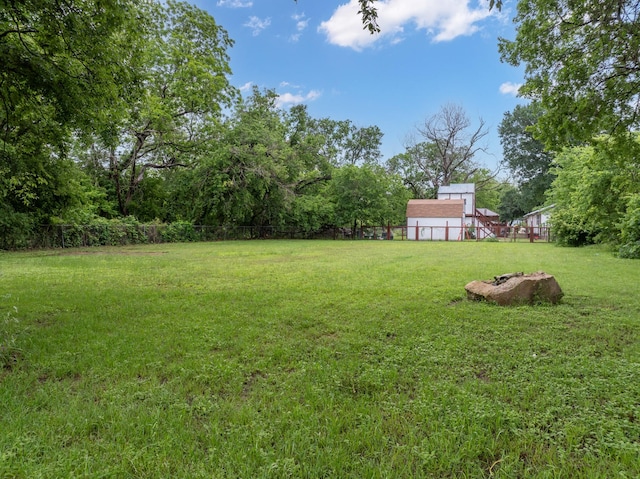 view of yard with fence