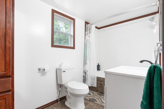 bathroom featuring vanity, a shower with shower curtain, tile patterned floors, and toilet