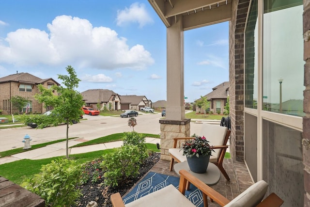 9208 Amistad Ln, Denton, TX 76226 - balcony with a residential view and covered porch