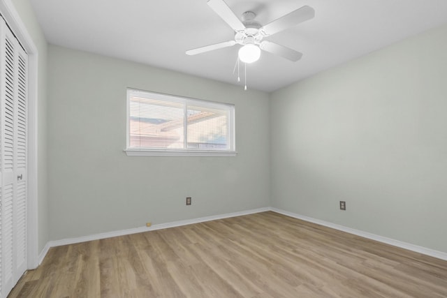 3617 Walton Ave, Fort Worth, TX 76133 - unfurnished bedroom featuring a closet, light wood-style flooring, ceiling fan, and baseboards