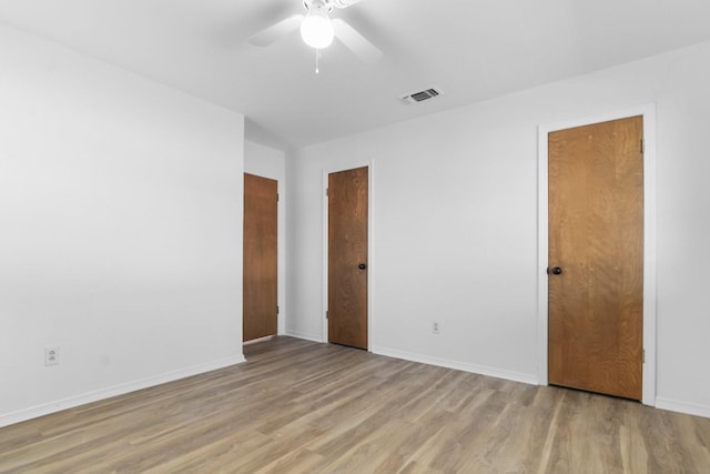 3617 Walton Ave, Fort Worth, TX 76133 - unfurnished bedroom with a ceiling fan, baseboards, visible vents, and wood finished floors