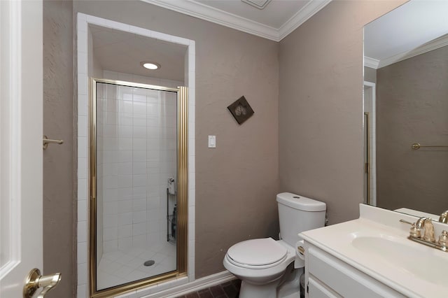 bathroom with toilet, a shower stall, ornamental molding, and vanity