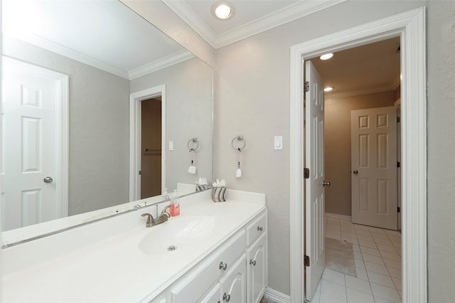 bathroom with tile patterned flooring, vanity, ornamental molding, and recessed lighting