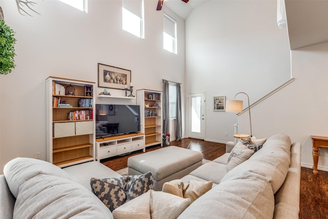 2224 Miramar Dr, Little Elm, TX 75068 - living area with baseboards, a high ceiling, a ceiling fan, and dark wood-style floors