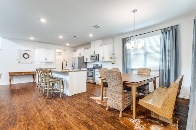 2224 Miramar Dr, Little Elm, TX 75068 - dining space with a chandelier, visible vents, dark wood finished floors, and recessed lighting