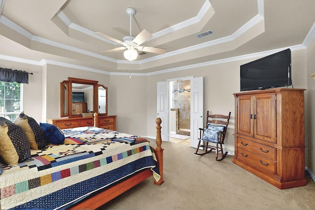 bedroom with crown molding, a raised ceiling, light carpet, and visible vents