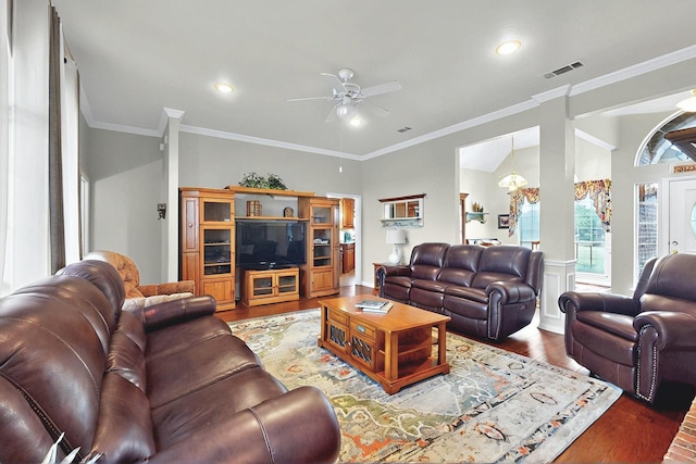 living area with ceiling fan, visible vents, wood finished floors, ornamental molding, and recessed lighting