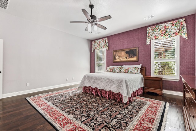 245 Prairie Oak Ct, Burleson, TX 76028 - bedroom with baseboards, dark wood-style floors, and a ceiling fan