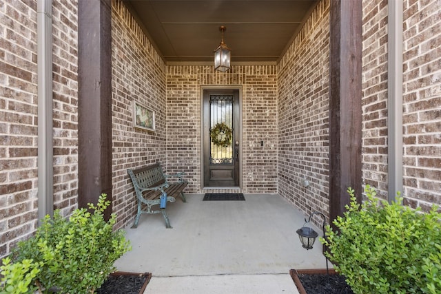 245 Prairie Oak Ct, Burleson, TX 76028 - view of exterior entry featuring brick siding