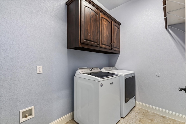 245 Prairie Oak Ct, Burleson, TX 76028 - laundry area featuring cabinet space, washing machine and clothes dryer, and baseboards