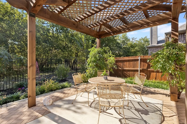 245 Prairie Oak Ct, Burleson, TX 76028 - fenced backyard featuring a pergola, outdoor dining area, and a patio