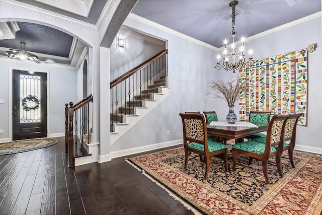 245 Prairie Oak Ct, Burleson, TX 76028 - dining area with stairway, hardwood / wood-style flooring, a chandelier, baseboards, and ornamental molding