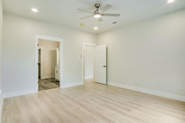 unfurnished bedroom with recessed lighting, baseboards, visible vents, and light wood-style flooring