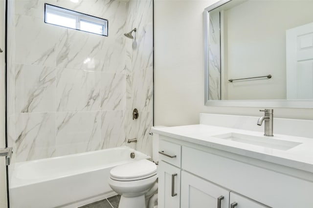 bathroom featuring vanity, shower / bathing tub combination, and toilet