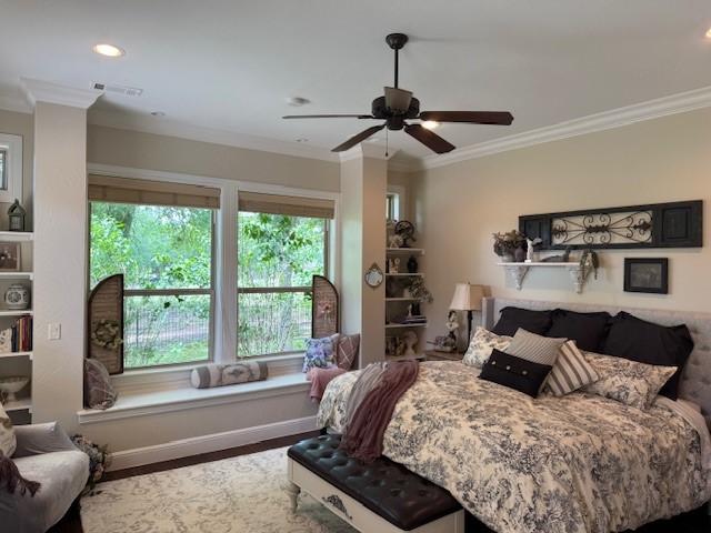 bedroom with ceiling fan, visible vents, wood finished floors, ornamental molding, and recessed lighting