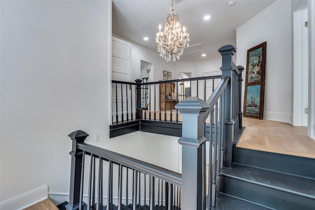 805 Howell St, Mckinney, TX 75069 - stairs with a chandelier, recessed lighting, baseboards, and wood finished floors