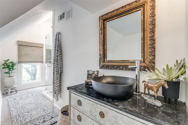 805 Howell St, Mckinney, TX 75069 - bathroom featuring visible vents, vanity, and a shower stall
