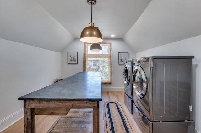 805 Howell St, Mckinney, TX 75069 - clothes washing area with light wood-type flooring, laundry area, baseboards, and washing machine and dryer