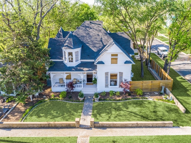 805 Howell St, Mckinney, TX 75069 - view of front of house with a porch, fence, a shingled roof, and a front lawn