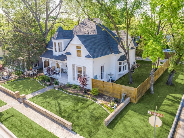 805 Howell St, Mckinney, TX 75069 - view of front of house featuring fence private yard, a shingled roof, and a front lawn