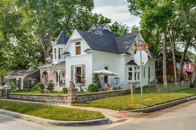 805 Howell St, Mckinney, TX 75069 - victorian-style house with covered porch and a shingled roof