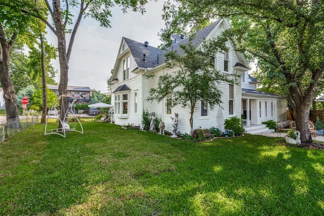 805 Howell St, Mckinney, TX 75069 - view of home's exterior featuring roof with shingles