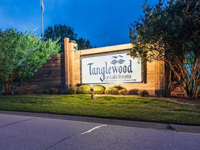2164 Tanglewood Blvd Unit A105, Pottsboro, TX 75076 - community sign featuring a lawn