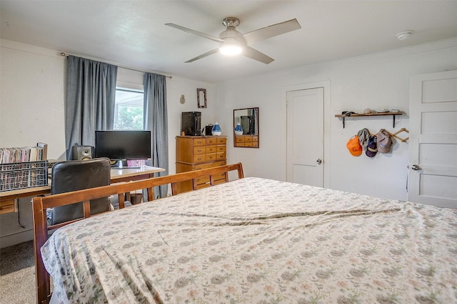 bedroom with crown molding and a ceiling fan