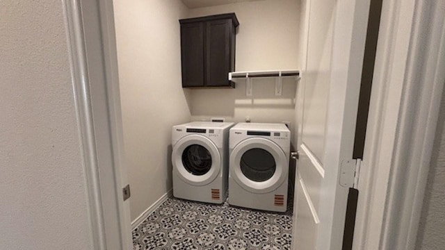 4189 Plateau Dr, Forney, TX 75126 - laundry room with washer and clothes dryer, cabinet space, light flooring, and baseboards