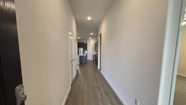 4189 Plateau Dr, Forney, TX 75126 - hallway featuring wood finished floors, recessed lighting, and baseboards