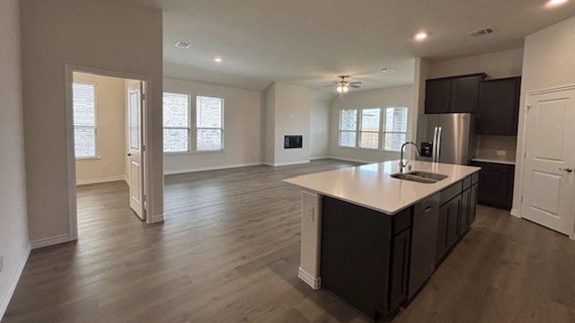 4189 Plateau Dr, Forney, TX 75126 - kitchen featuring a sink, stainless steel fridge, ceiling fan, open floor plan, and recessed lighting