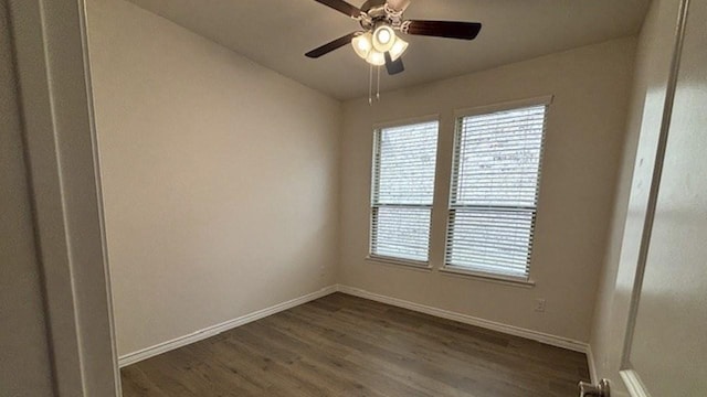 4189 Plateau Dr, Forney, TX 75126 - empty room featuring baseboards, dark wood-style flooring, and a ceiling fan