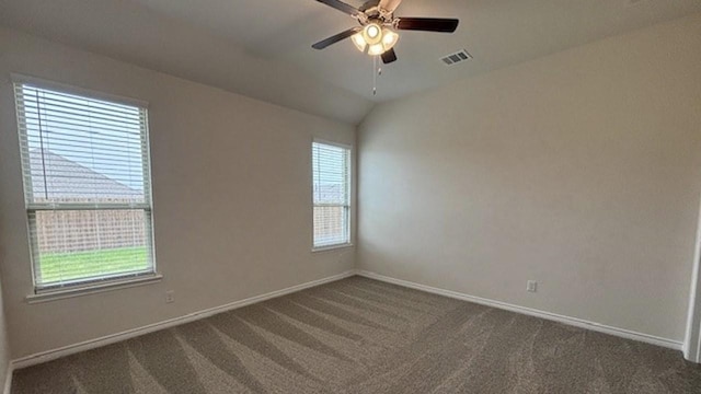 4189 Plateau Dr, Forney, TX 75126 - unfurnished room with healthy amount of natural light, dark carpet, baseboards, ceiling fan, and lofted ceiling
