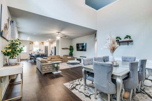 dining area featuring ceiling fan and wood finished floors