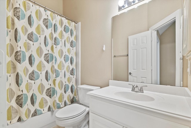 bathroom with toilet, shower / bath combo, and vanity