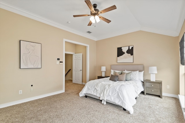 bedroom with crown molding, carpet flooring, visible vents, and vaulted ceiling
