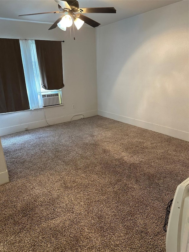 630 W College St, Stephenville, TX 76401 - empty room featuring cooling unit, ceiling fan, baseboards, and carpet